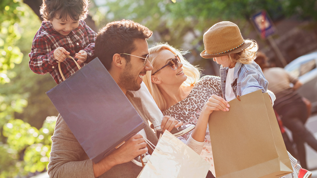 A family go shopping happily; image used for HSBC Australia Credit Cards FAQs.