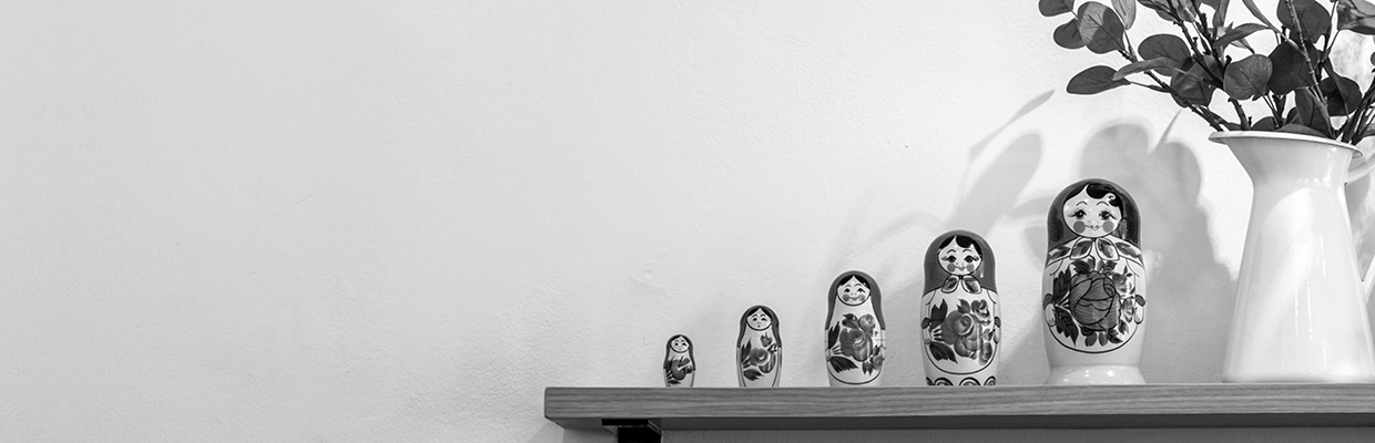 A set of matryoshka dolls displacing on shelf; image used for HSBC Australia Transaction Accounts page.