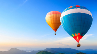 Balloons over a rain forest; image used for international service page.