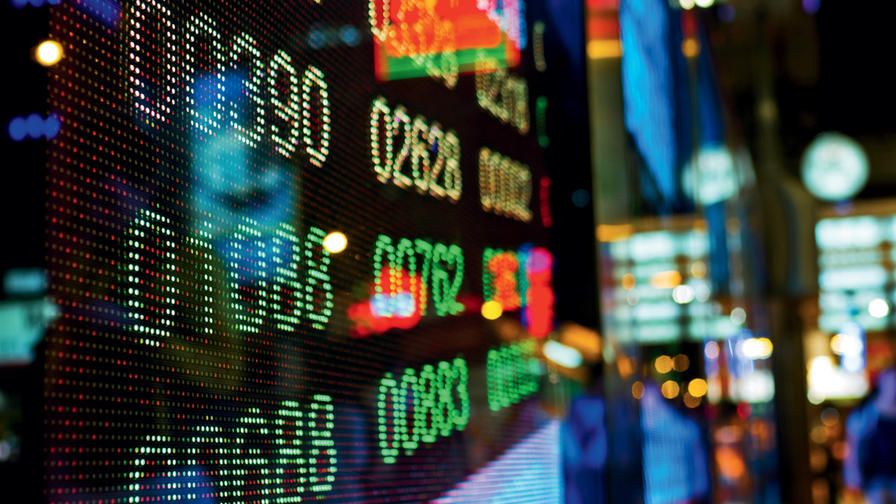 A market board showing numbers; image used for HSBC AU online share trading.
