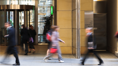 People walking on street; image used for Investing in Australia or overseas.