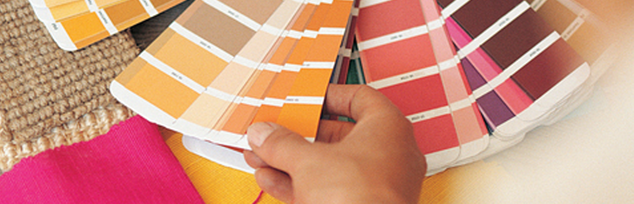A person holding a set of colouring pallet; image used for HSBC Merchant Services.