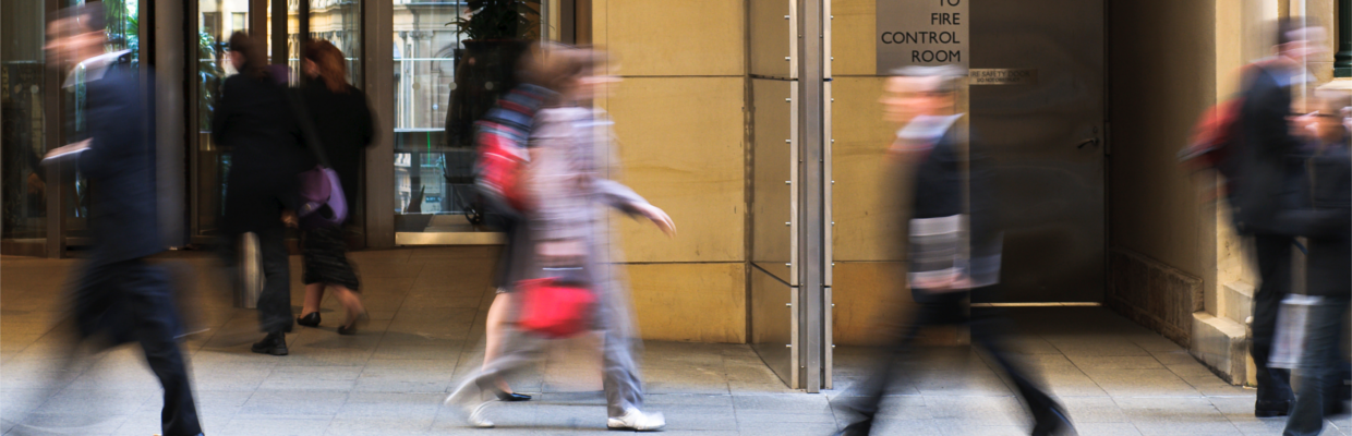 People walking on street; image used for Investing in Australia or overseas.