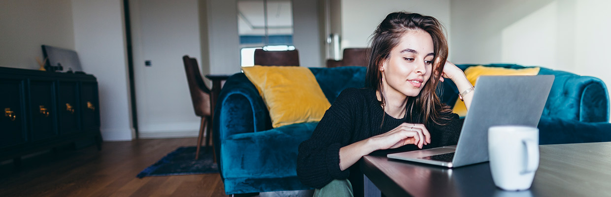 A woman is using mobile banking; image used for HSBC how do I find my HSBC Account number and BSB code page.