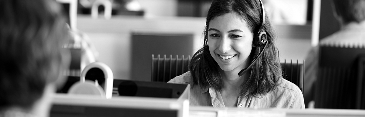 A professional assistant providing supports and guidance for banking at home via a call with customer; image used for HSBC Australia Help page.