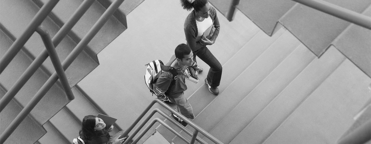 A group of students walking up staircase; image used for HSBC Australia New grads: avoid this common financial mistake.